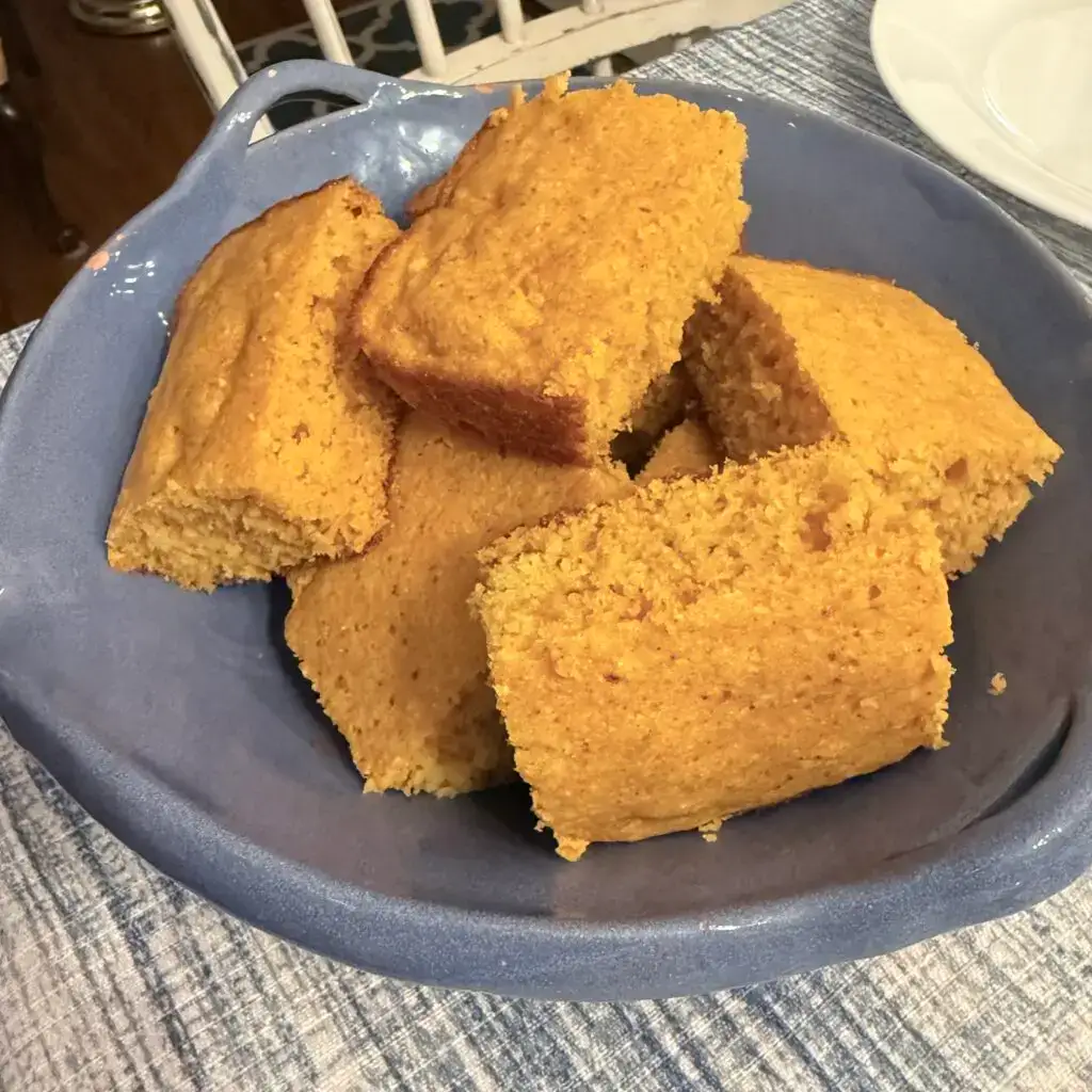 Enchilada cornbread - five pieces of enchilada cornbread in a blue bowl