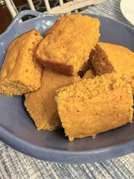 Enchilada cornbread - five pieces of enchilada cornbread in a blue bowl